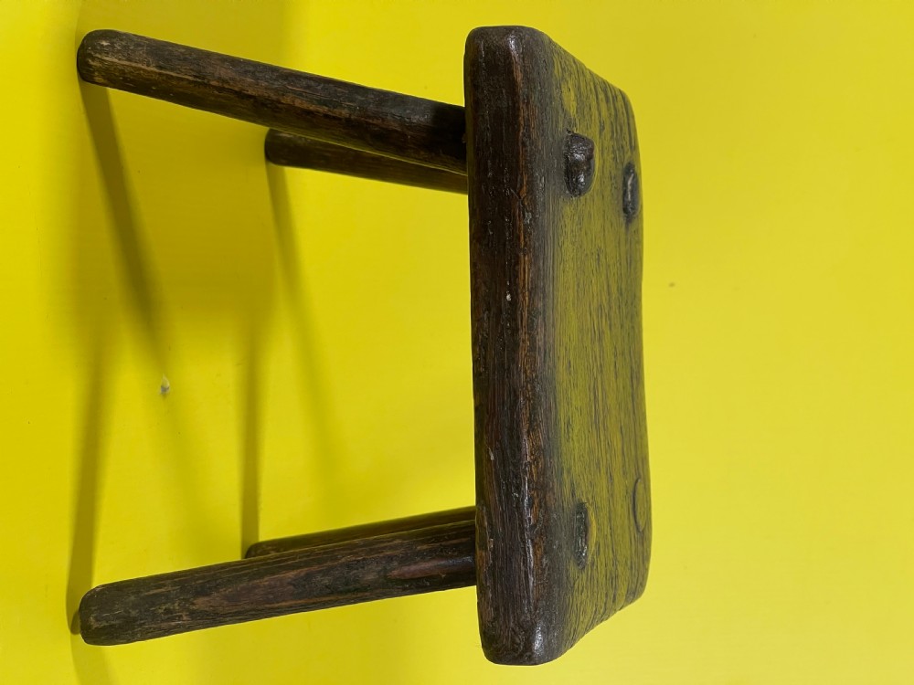 An Antique Stool with remnants of the old green paint View IX