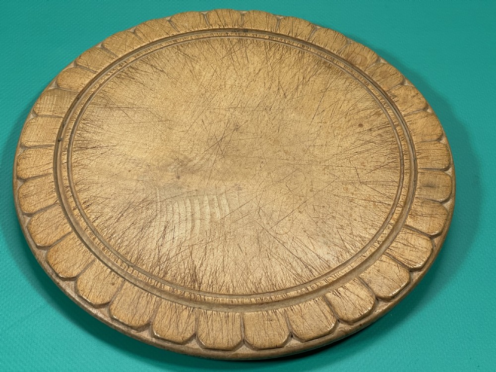 A Treen Sycamore Bread Board - Vandyke design