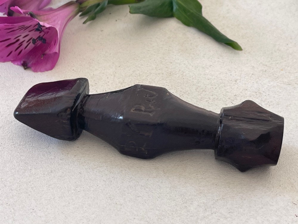 An antique treen sailors rubber  View V