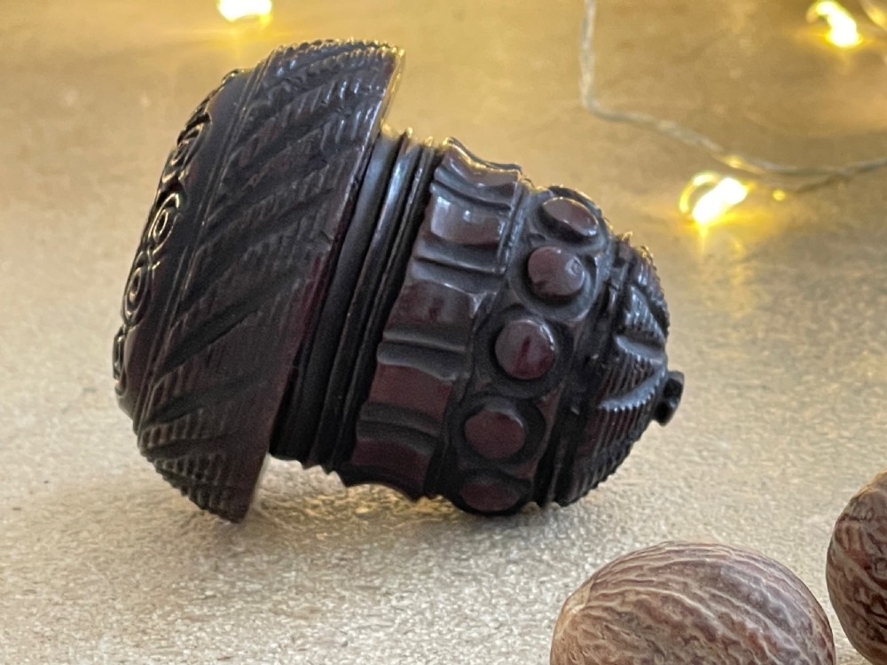 An Antique Treen Coquilla Nutmeg Grater - intricately carved View III
