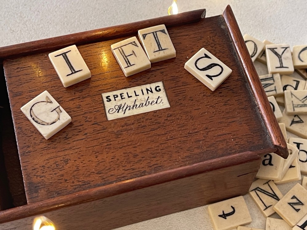 An Antique Alphabet & Spelling Box - over 80 bone letters View III