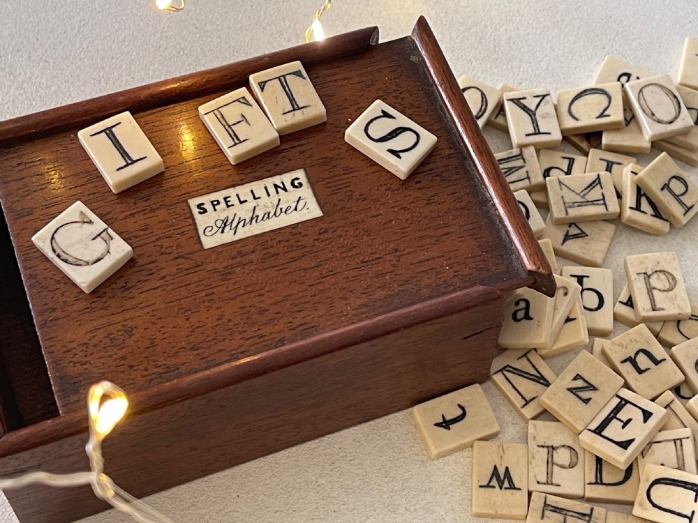 An Antique Alphabet & Spelling Box - over 80 bone letters View IV