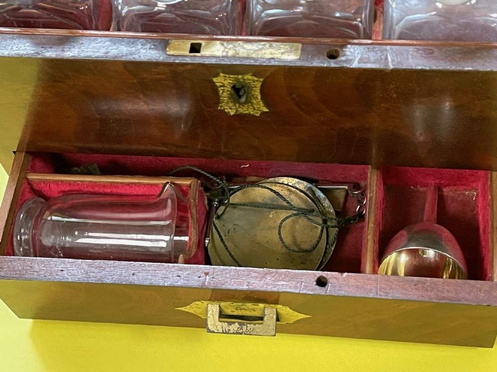 A lovely flame mahogany apothecary case -with contents View IV