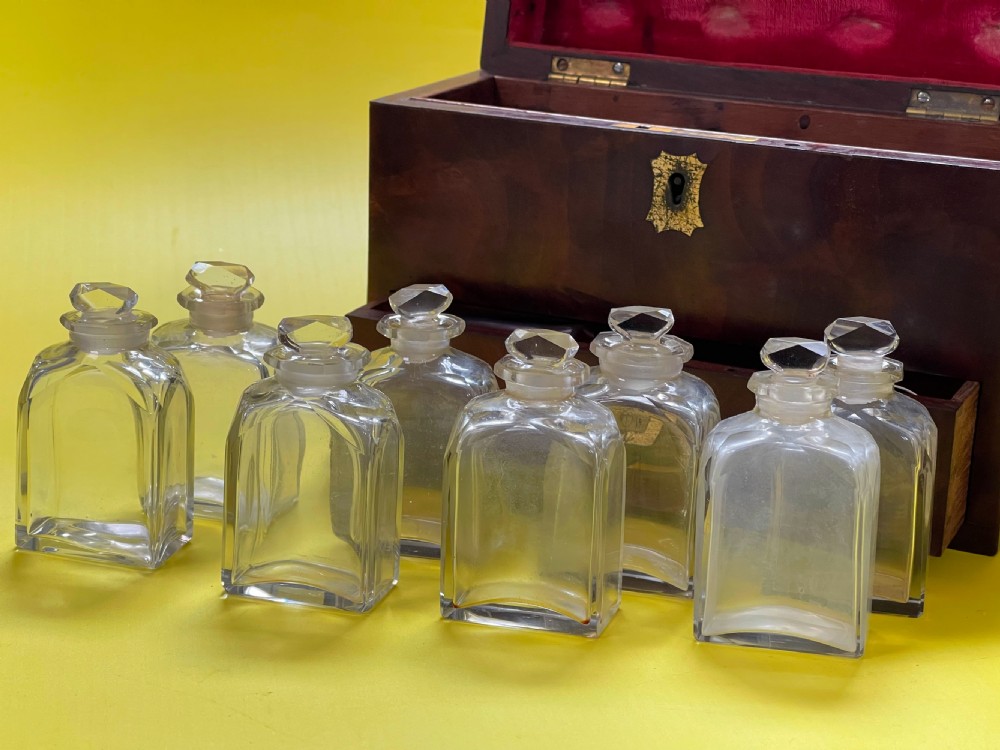 A lovely flame mahogany apothecary case -with contents View V