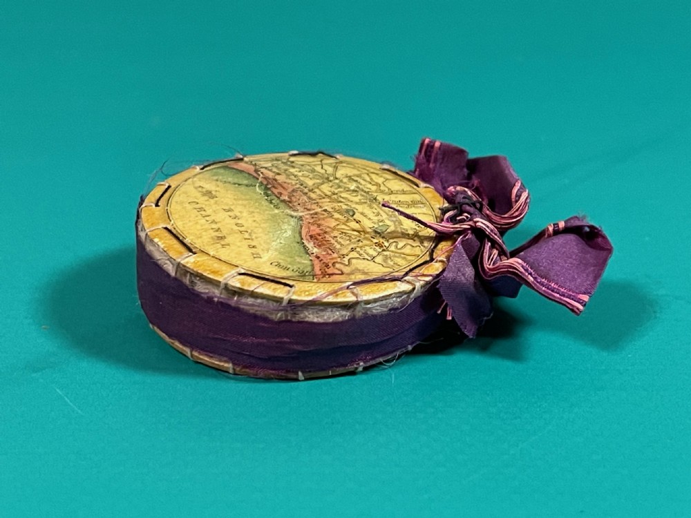An early Tunbridge Ware whitewood  pin wheel/ pin cushion. - with coastline map View III