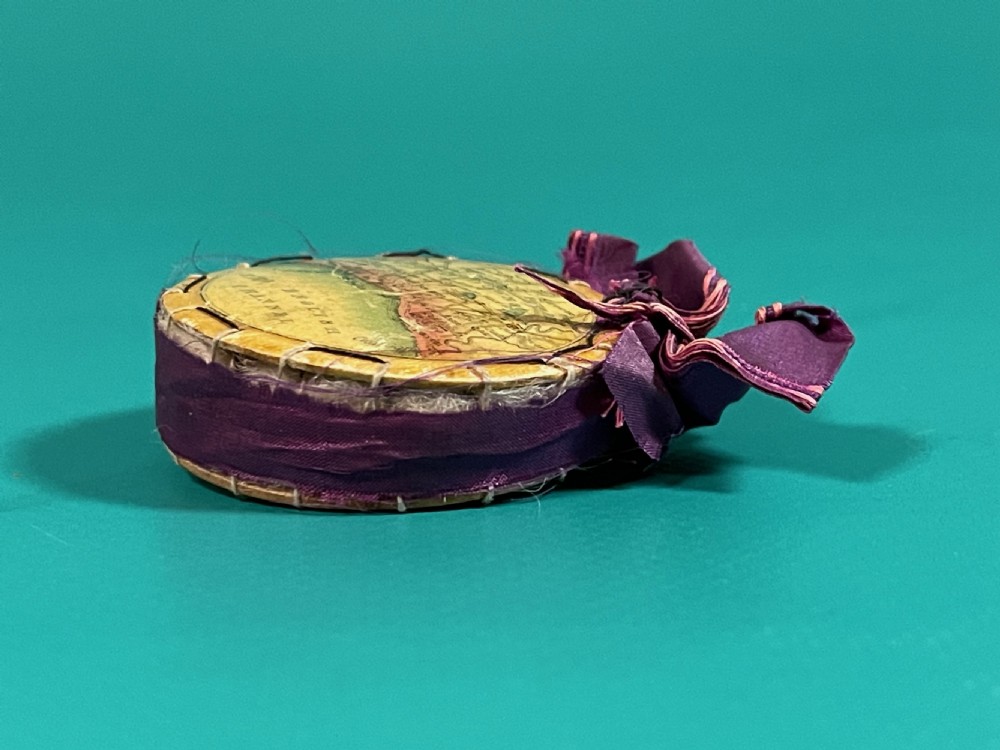 An early Tunbridge Ware whitewood  pin wheel/ pin cushion. - with coastline map View IV