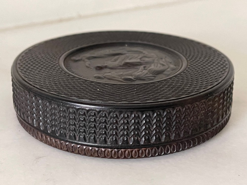 An Antique Snuff Box - Ebony Engine Turned, Haydn/ Shakespeare View III