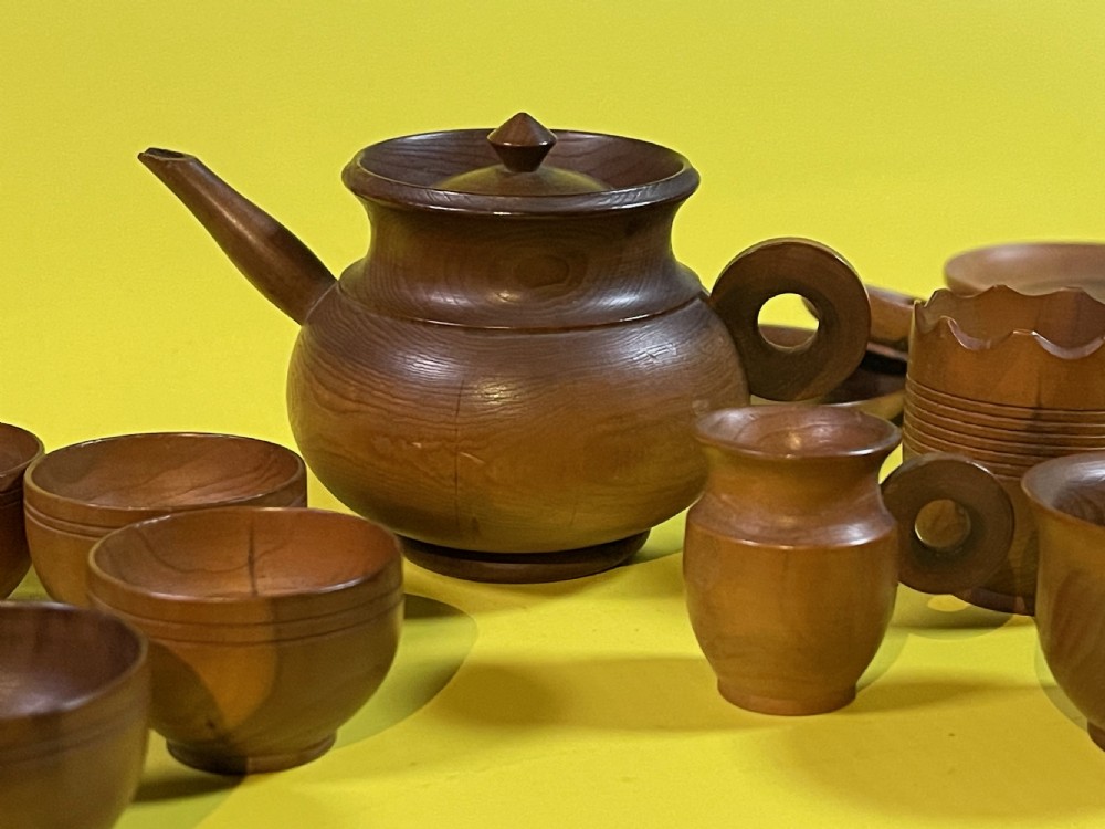 An Antique cedar wood miniature tea set