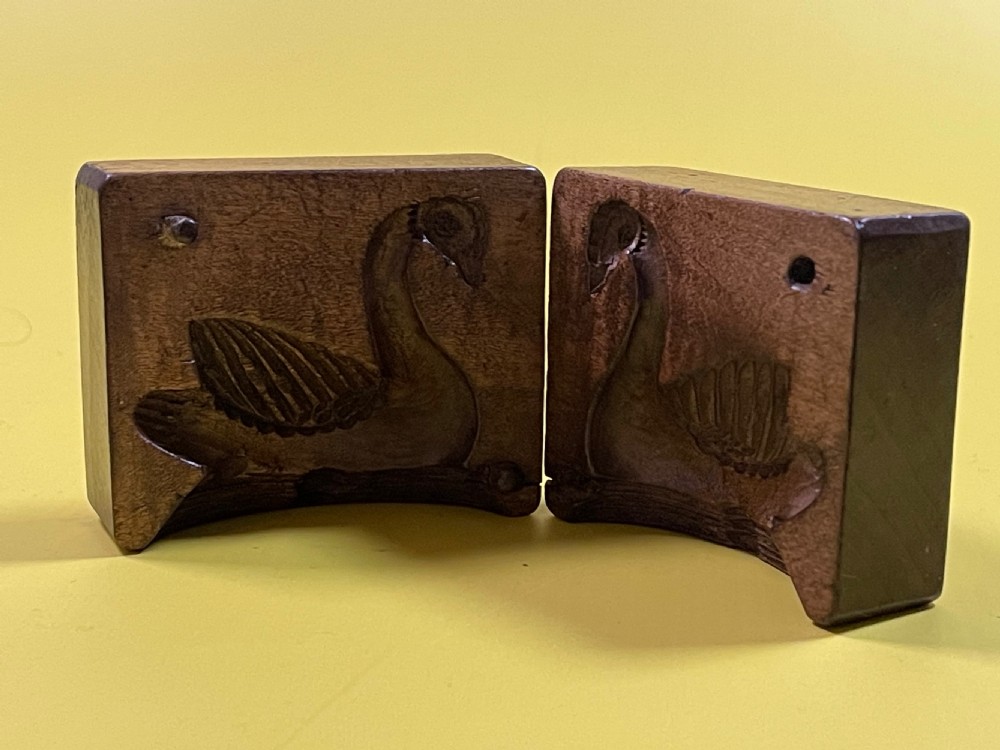 A Double Antique Treen Butter Mould
