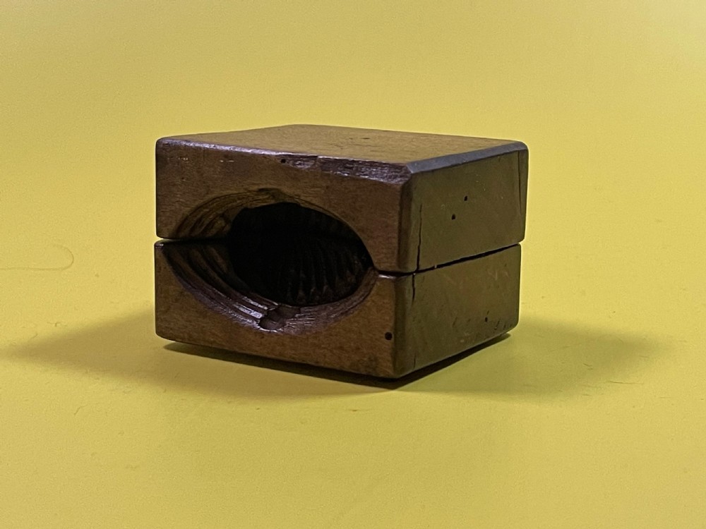 A Double Antique Treen Butter Mould View III