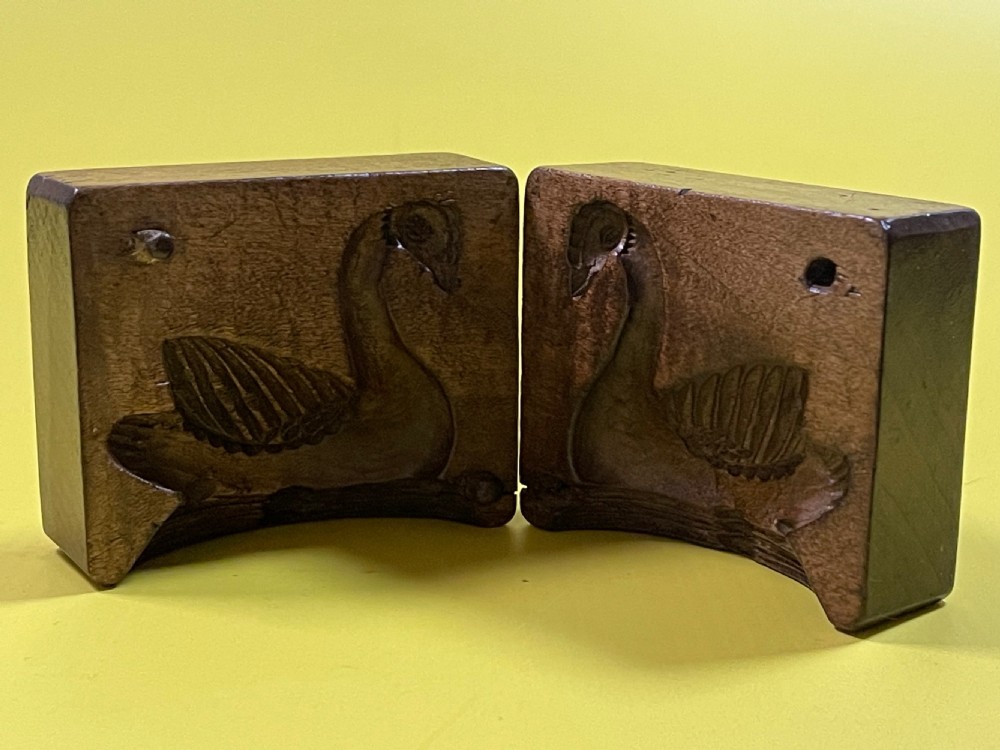 A Double Antique Treen Butter Mould View VI