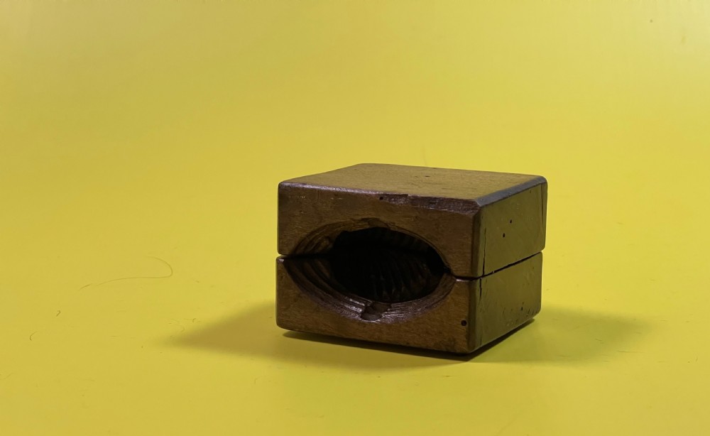 A Double Antique Treen Butter Mould View VIII