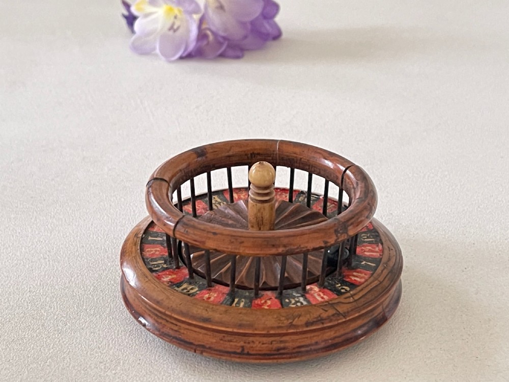 An unusual 19th century mini roulette game - ex  Charlton Collection. View V