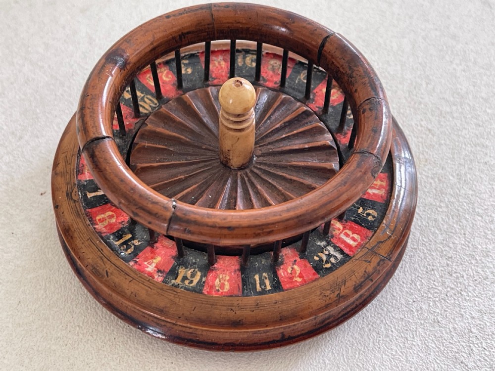 An unusual 19th century mini roulette game - ex  Charlton Collection. View VI