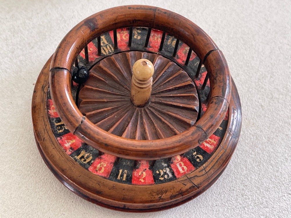 An unusual 19th century mini roulette game - ex  Charlton Collection. View XIII