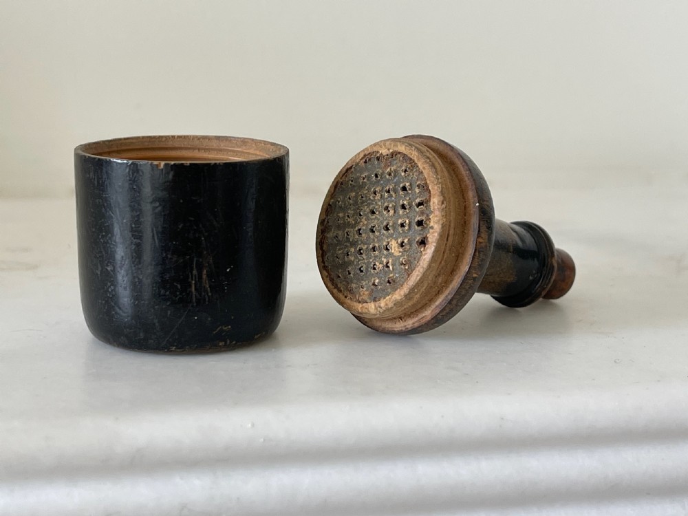 An  early 19th century painted sycamore nutmeg grater View II