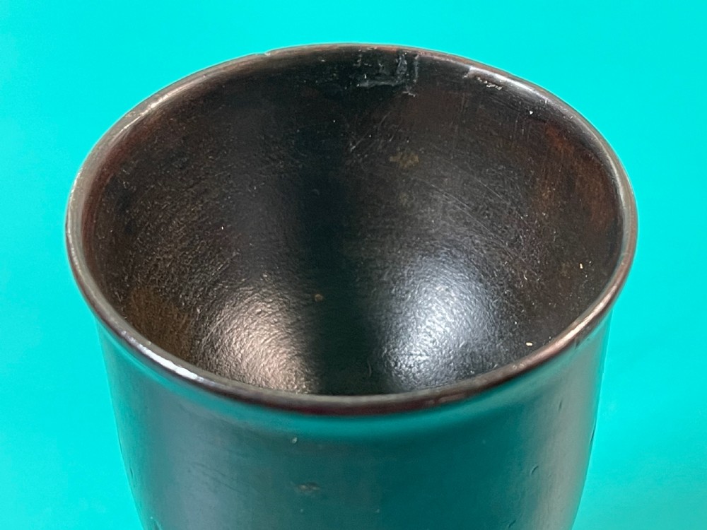 A dark turned plumwood goblet featuring a flared rim, a turned stem, and a circular pedestal base. View IV
