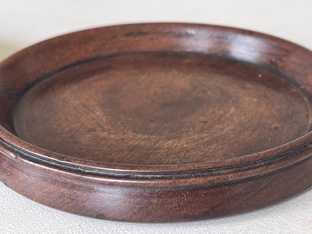 A Pair of Antique Mahogany Wine Coasters View V