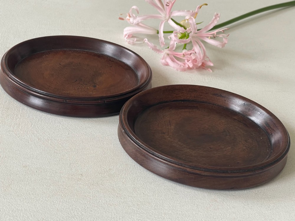 A Pair of Antique Mahogany Wine Coasters View VI