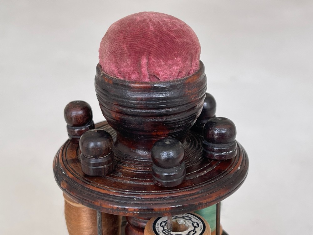 An Antique Treen Sewing Tower - reel holder & pin cushion View VI
