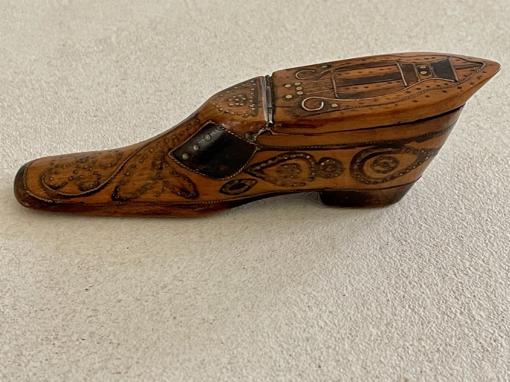 An Elaborately Decorated Snuff Shoe