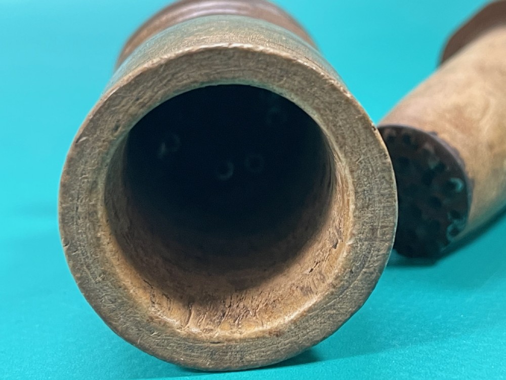 A small antique hand-turned wooden treen spice mortar grinder featuring baluster shaping and incised line detailing. View III