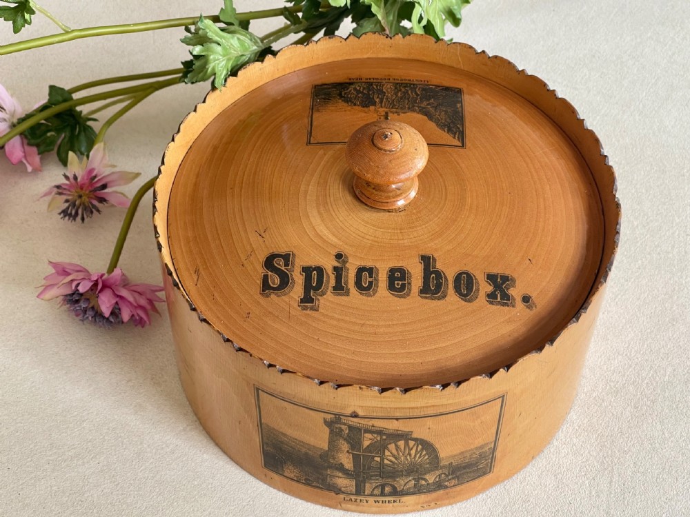 An Antique Spice Box with all its eight pots inside