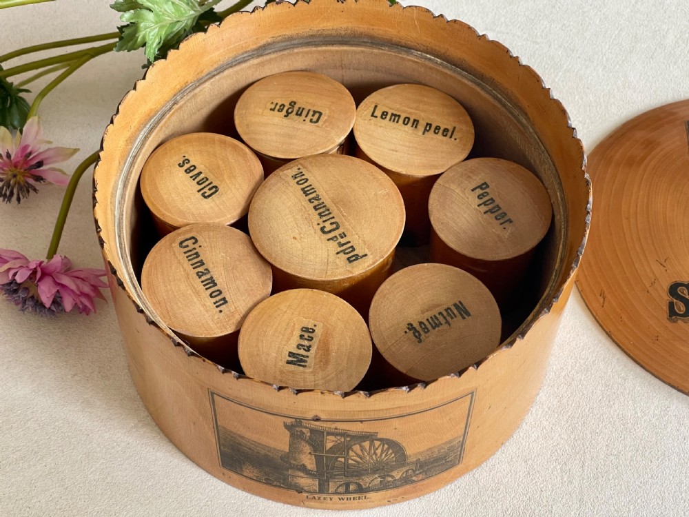 An Antique Spice Box with all its eight pots inside View II