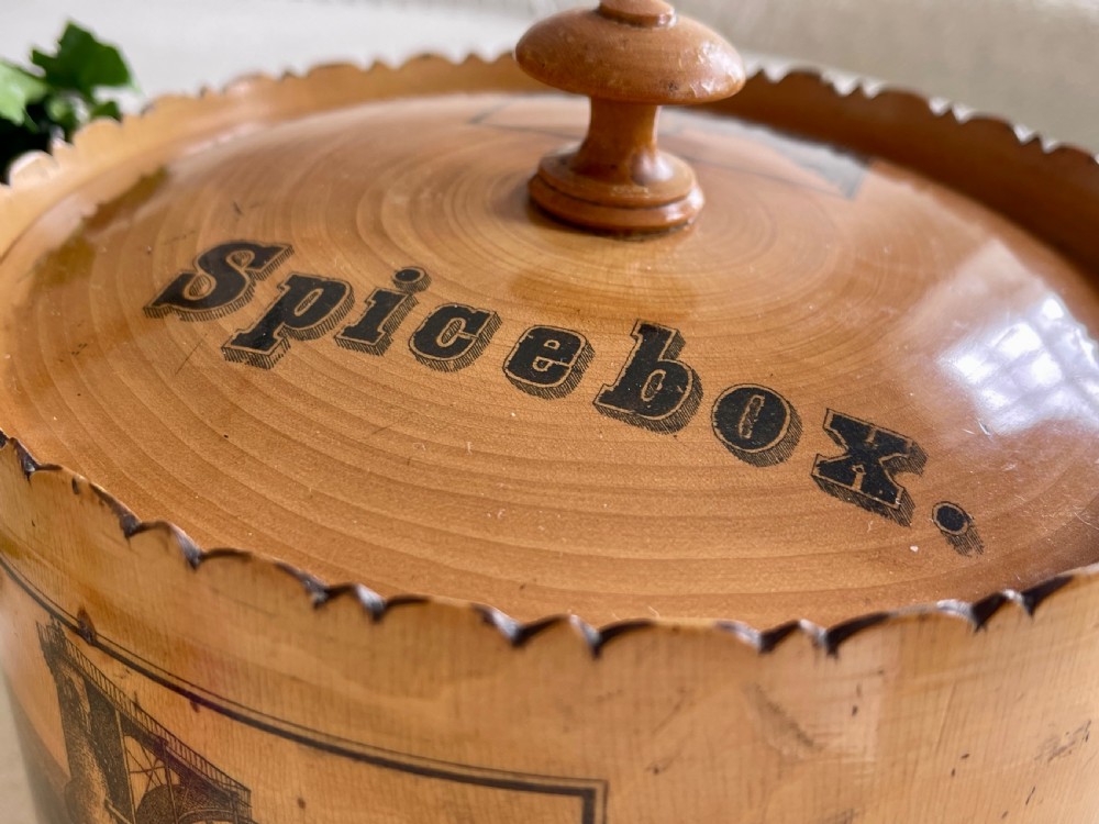 An Antique Spice Box with all its eight pots inside View III