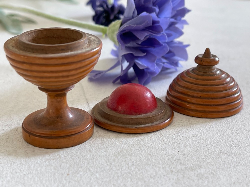 An Antique Treen Magic Trick View V