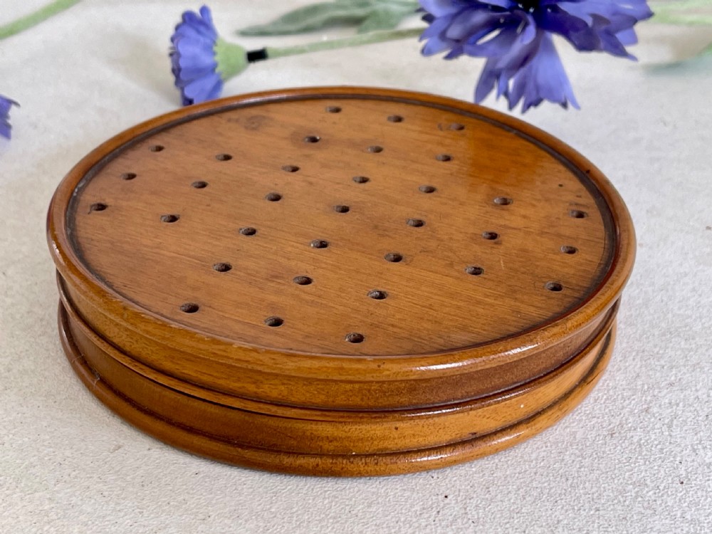 An Antique Treen Travelling Solitaire Game- complete with all its bone pegs View II