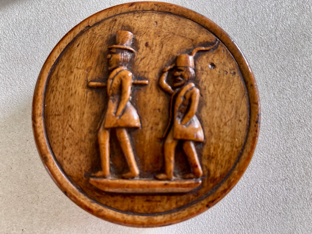 An Antique Carved Snuff Box - depicting two figures