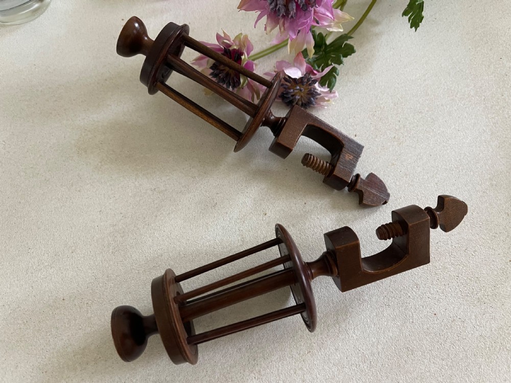 A Pair of Antique TreenSewing Reel Clamps