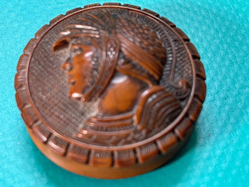 A round Georgian coquilla nut box with a hand-carved classical warrior profile in relief on the detachable lid. View III
