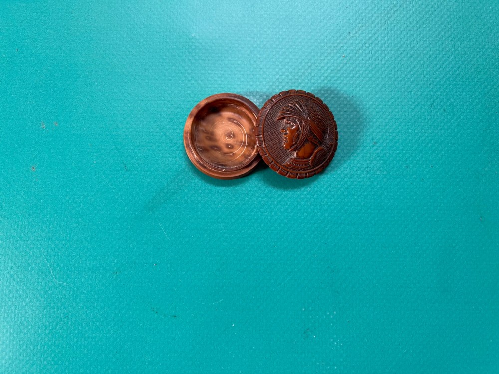 A round Georgian coquilla nut box with a hand-carved classical warrior profile in relief on the detachable lid. View IV
