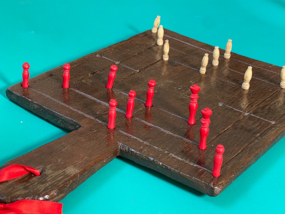 An Antique Nine Mans Morris Game