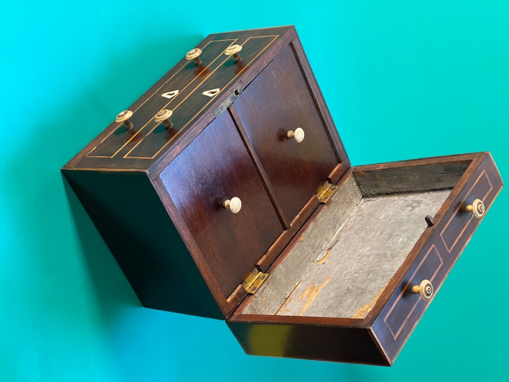 An Antique Tea Caddy in the shape of a Chest of Drawers View II