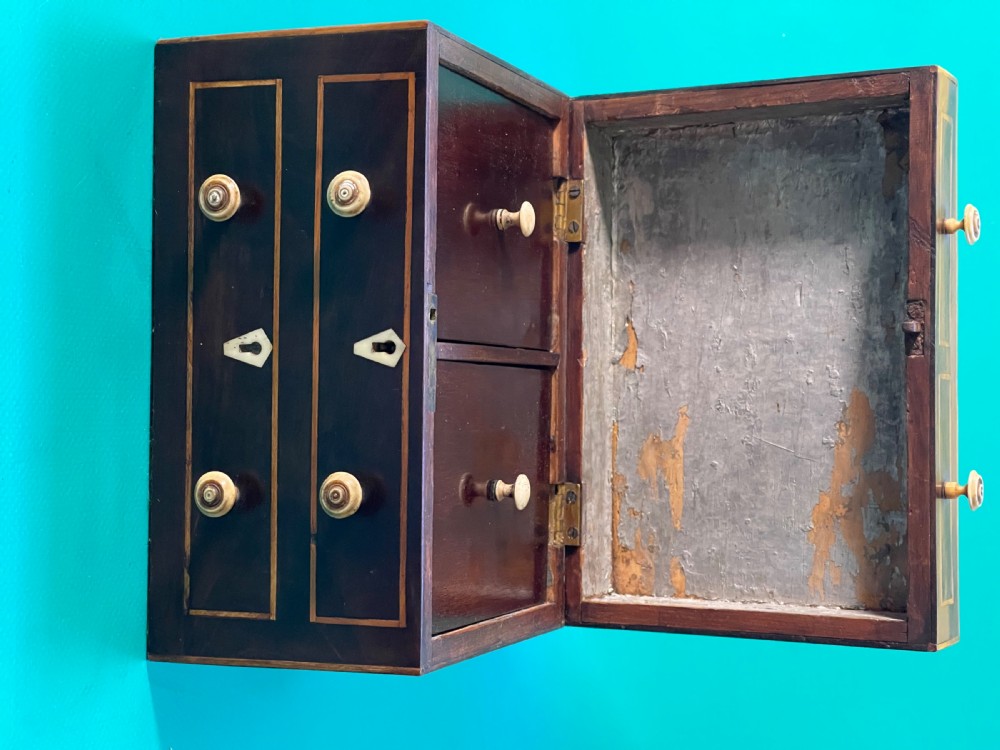 An Antique Tea Caddy in the shape of a Chest of Drawers View IV