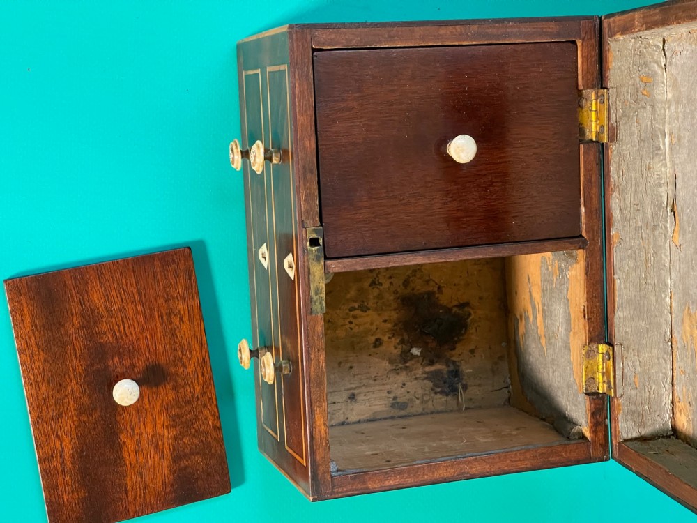An Antique Tea Caddy in the shape of a Chest of Drawers View V