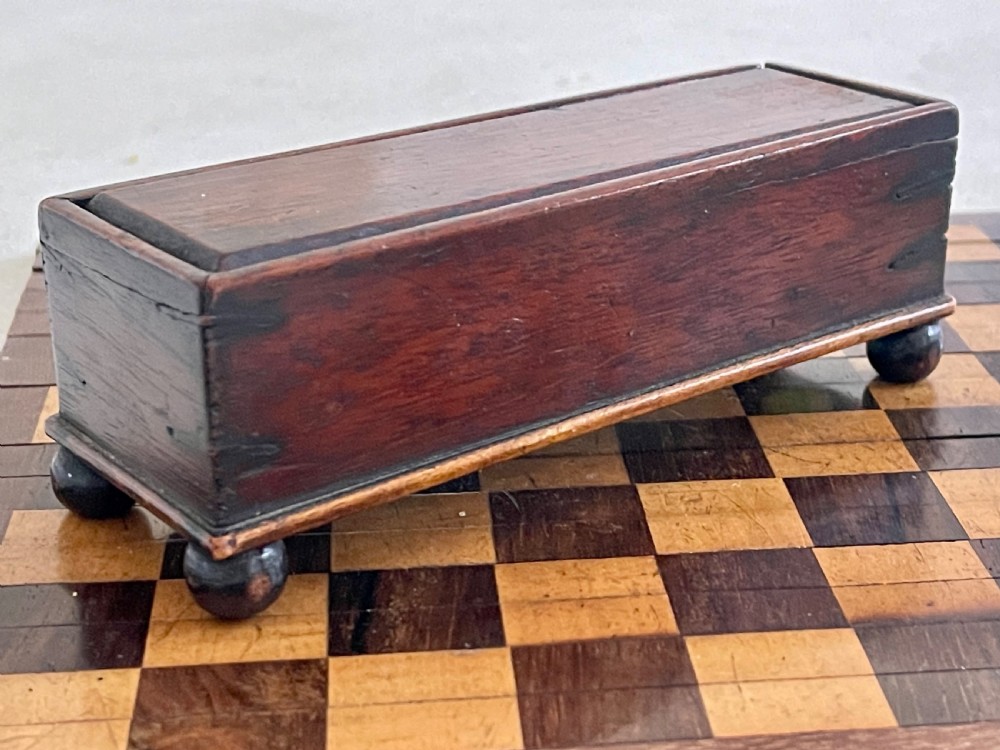 A Small Roll Up Chess Board & Boxed Chess Pieces View IV