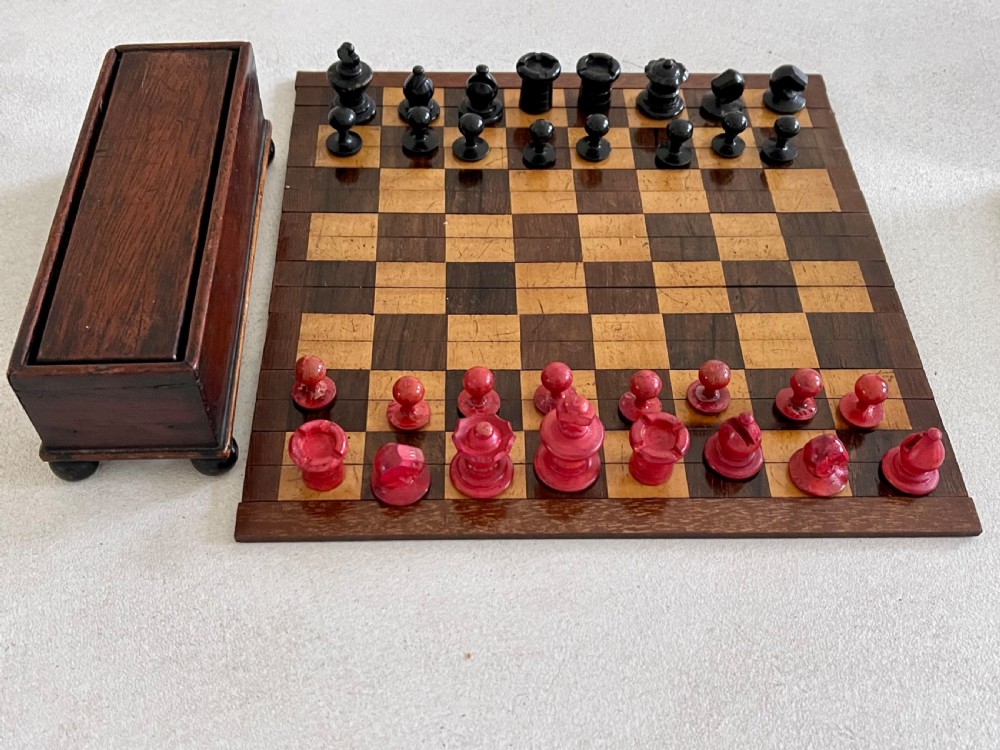 A Small Roll Up Chess Board & Boxed Chess Pieces View IX