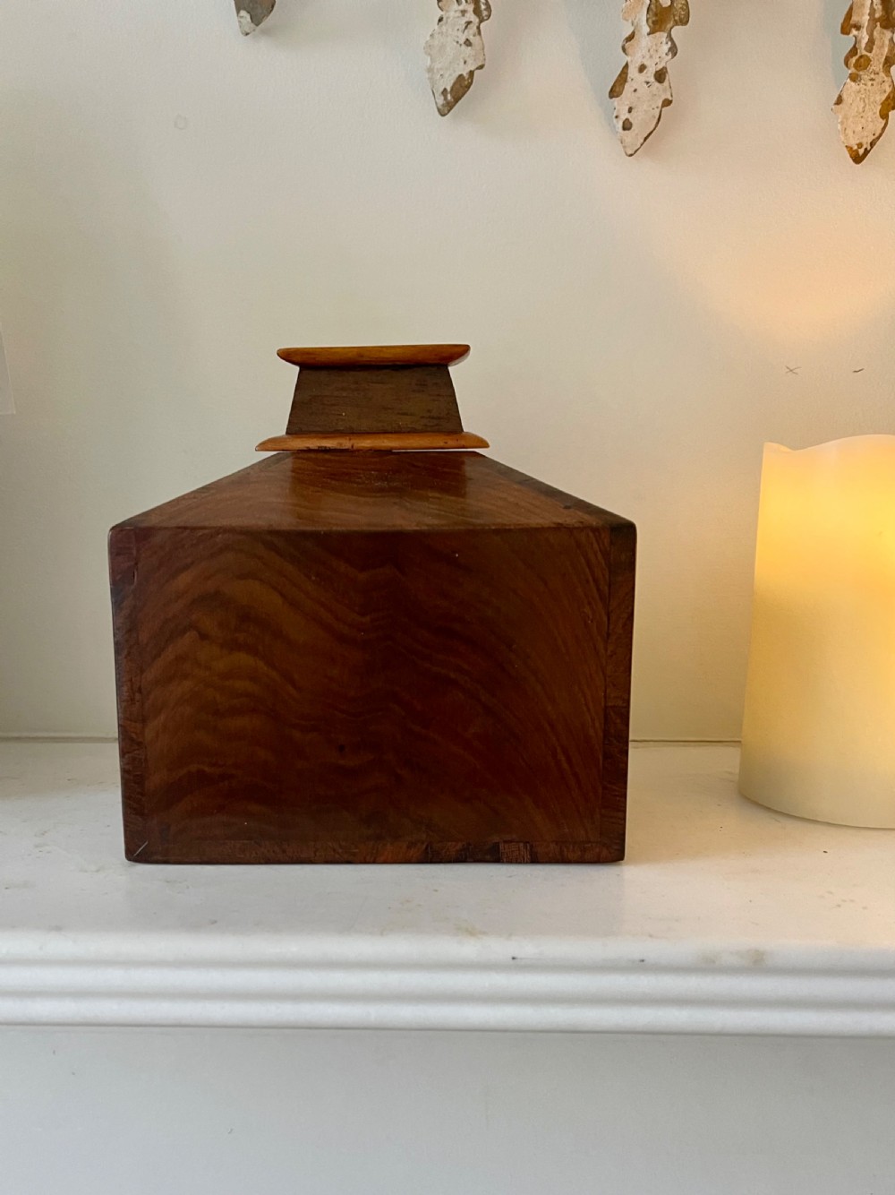 An Antique House Shaped Money Box