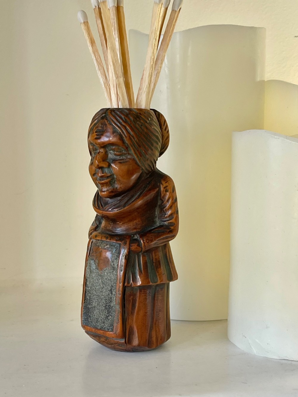 An Antique Treen Figural Match Holder View IV