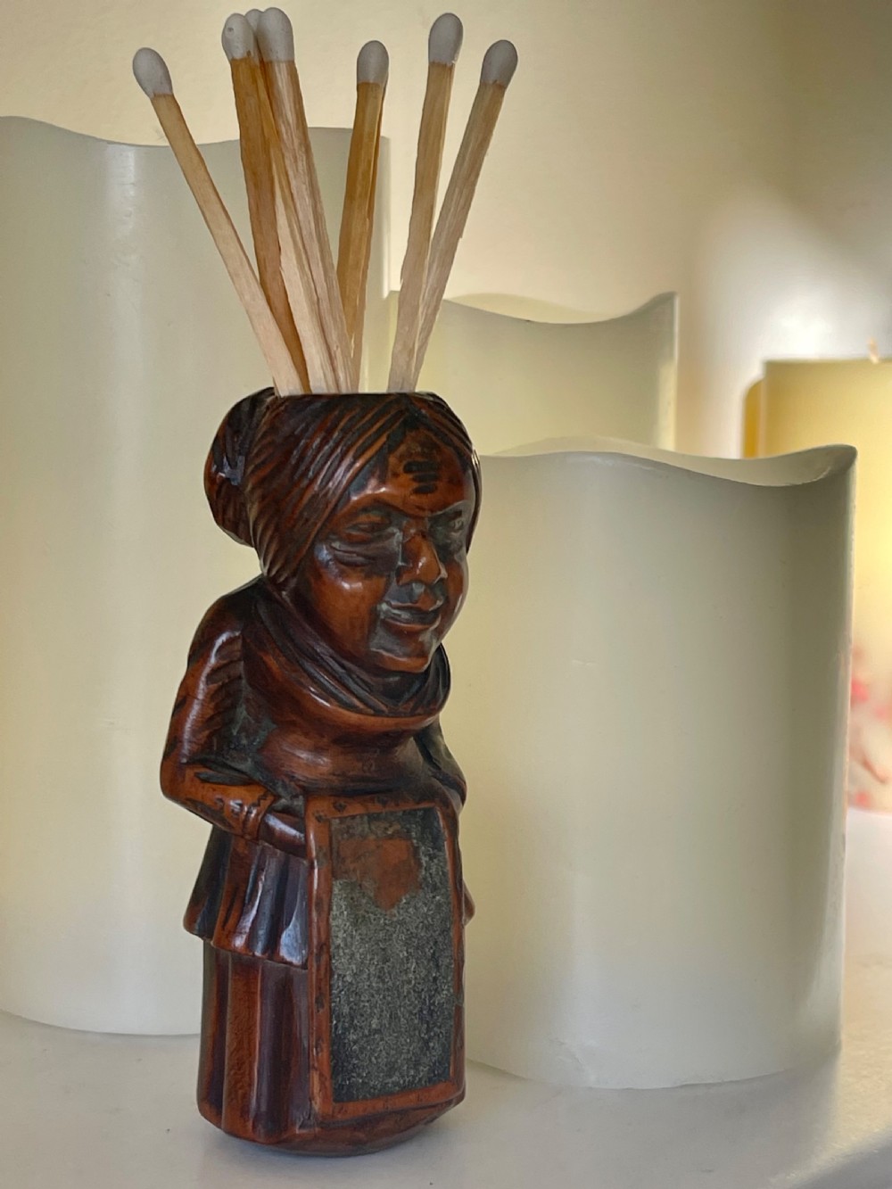 An Antique Treen Figural Match Holder View VII