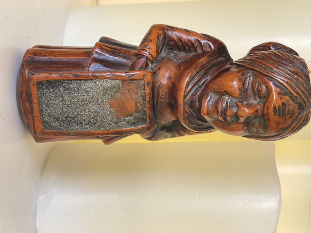 An Antique Treen Figural Match Holder View VIII