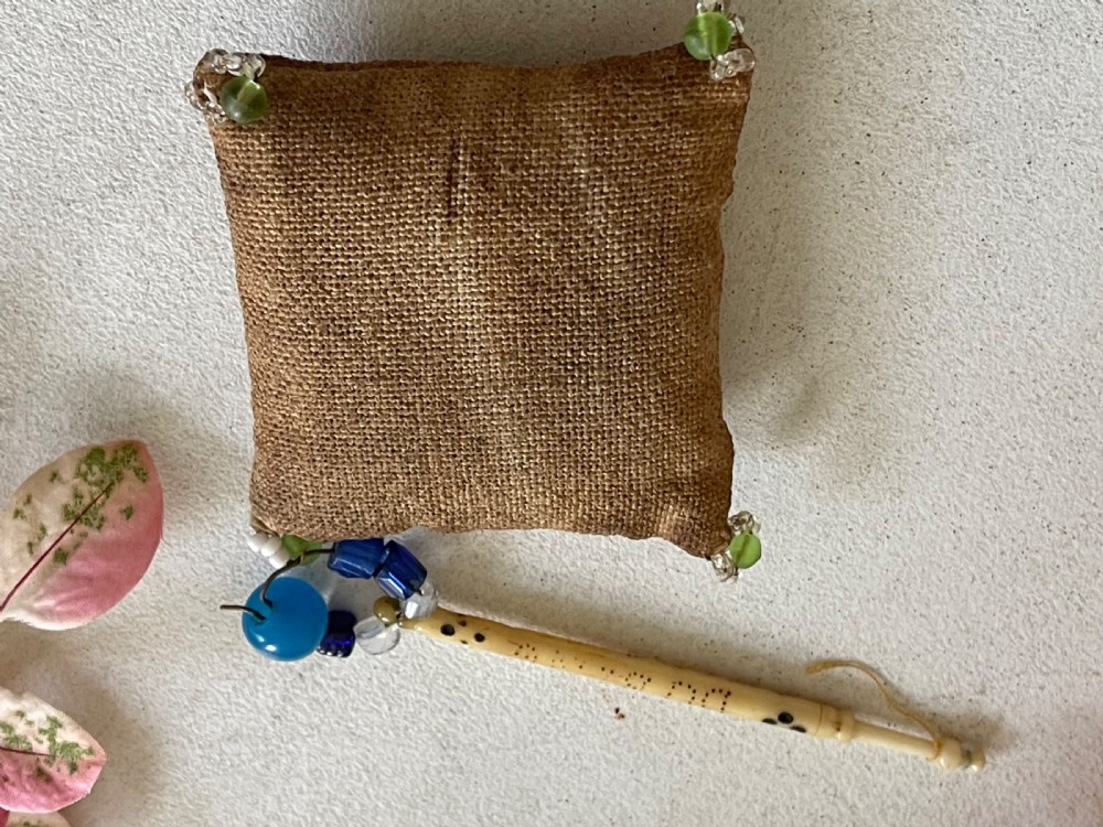 An Antique Lace Pillow and Bobbin - George Dubling View II
