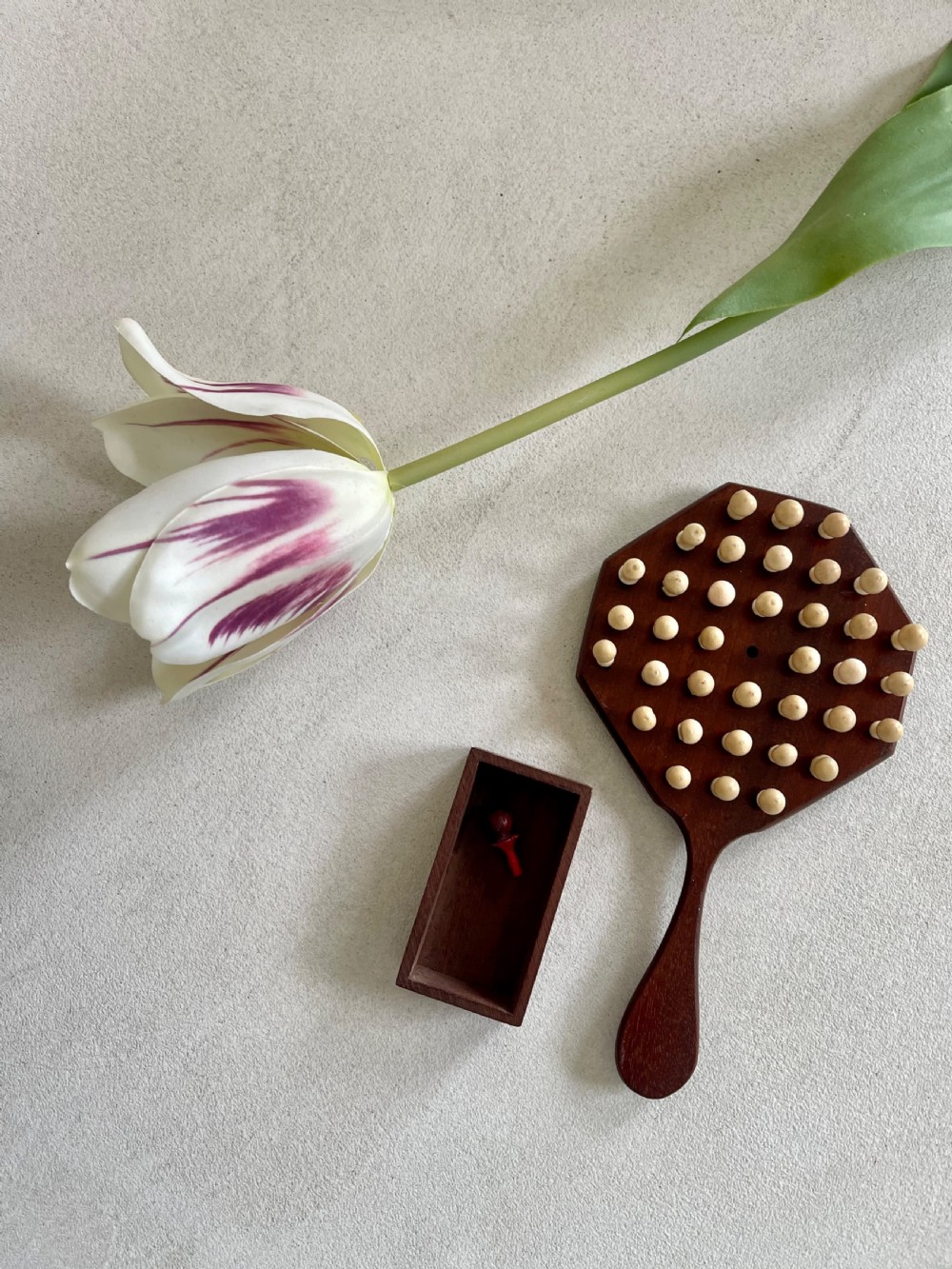 A Mini Sized Peg Solitaire Board & Bone  Pegs View II