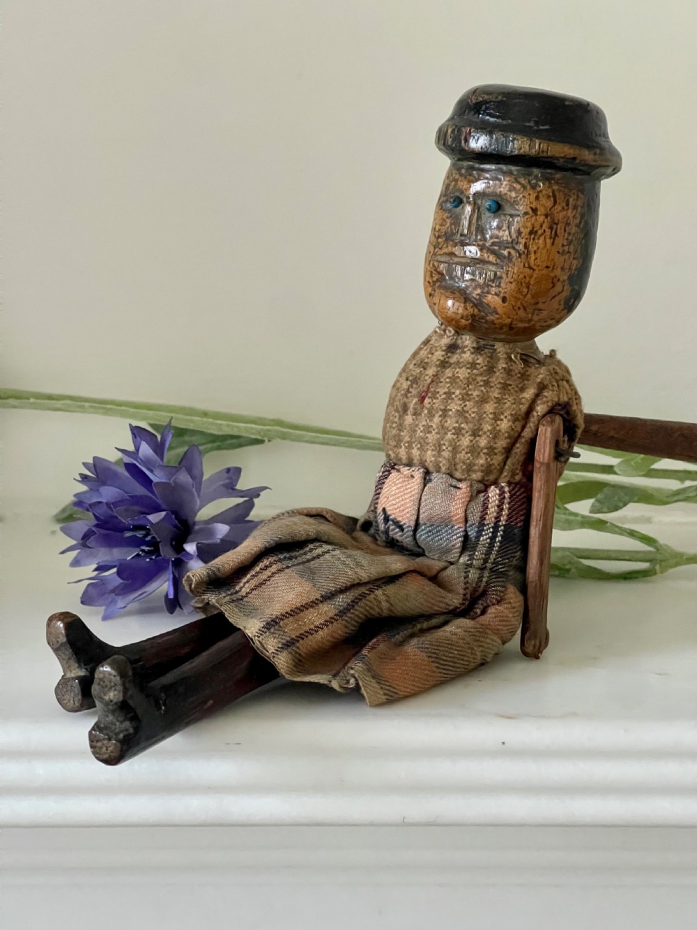 An Antique Wooden Jigger Doll