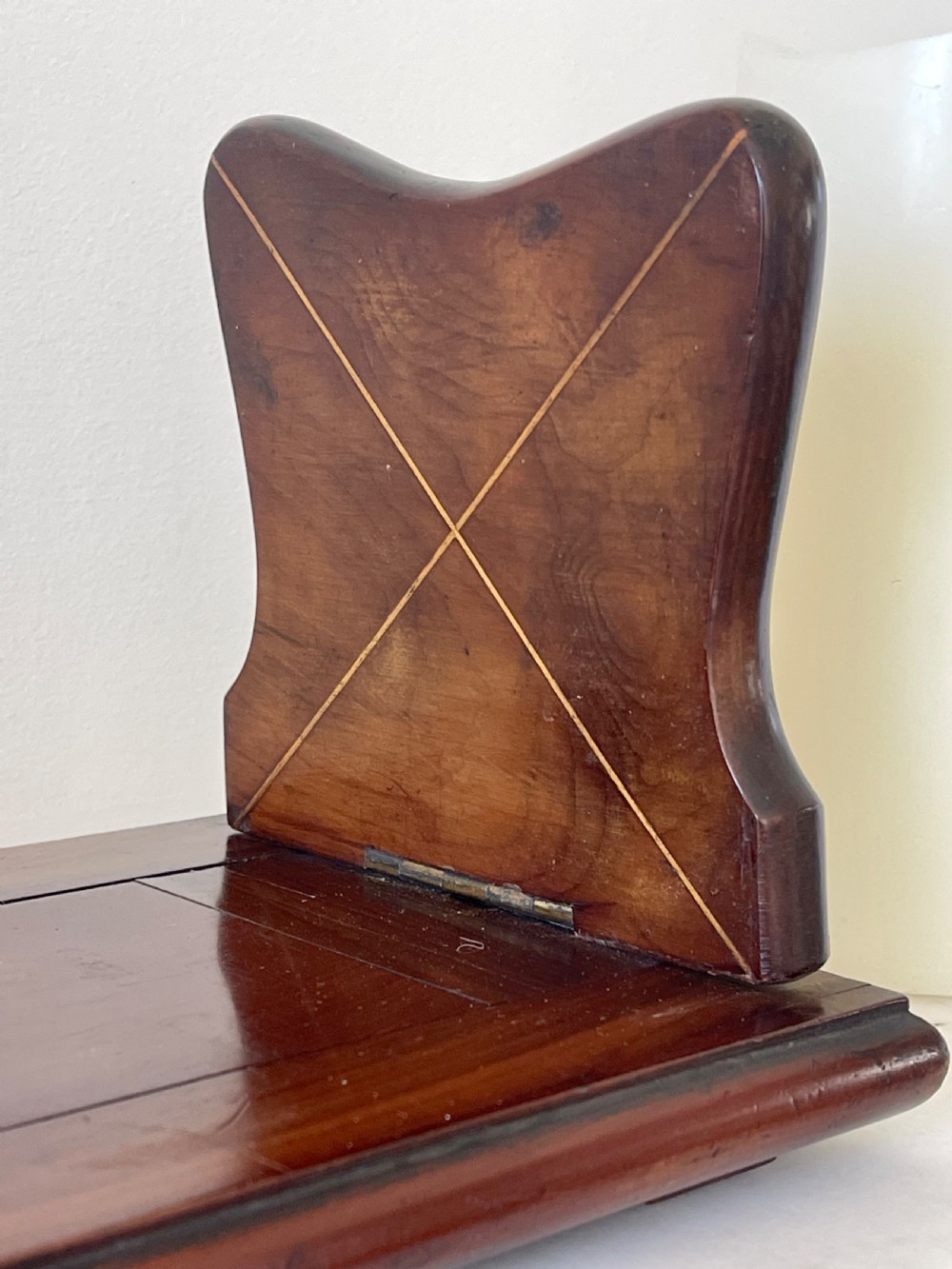 An antique Victorian Irish Killarney arbutus wood book slide featuring inlaid floral marquetry and folding hinged ends. View V
