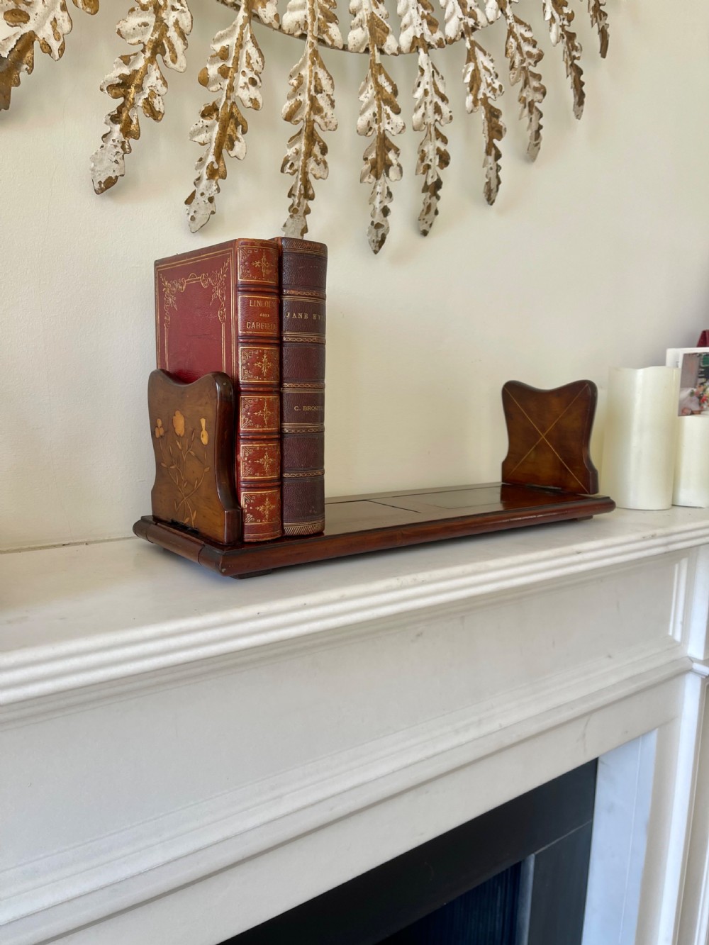 An antique Victorian Irish Killarney arbutus wood book slide featuring inlaid floral marquetry and folding hinged ends. View VI